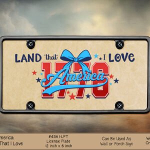 Patriotic license plate design reading 'Land That I Love America' with a blue bow and star accents in red, white, and blue colors.